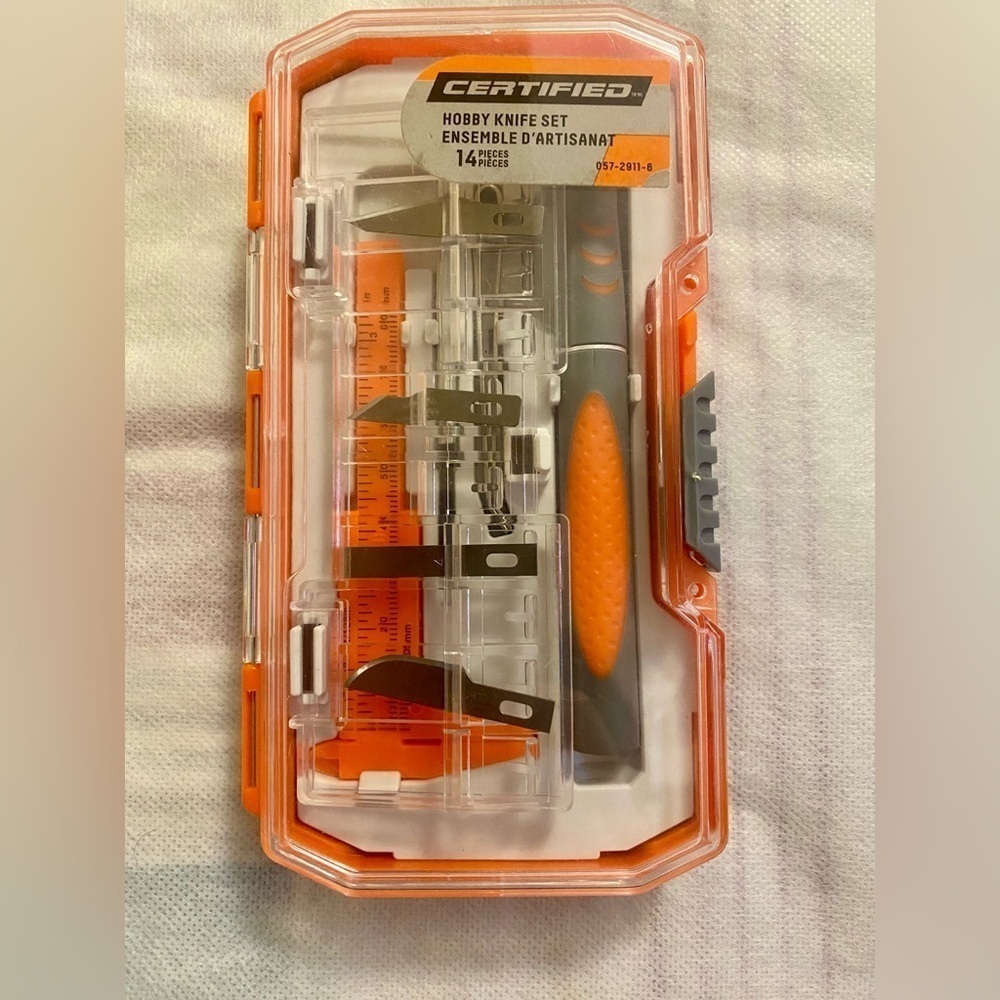 Certified Hobby Knife Set with Orange Accents. Some blades are missing 😶